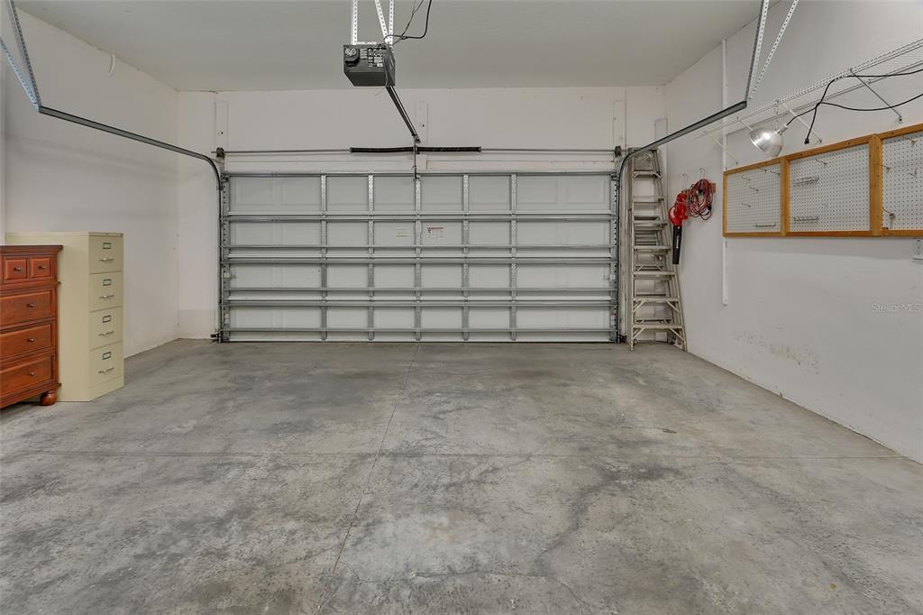 308 Locksley Court Deland, FL 32724 - Photo 25 of 56 a view of a garage