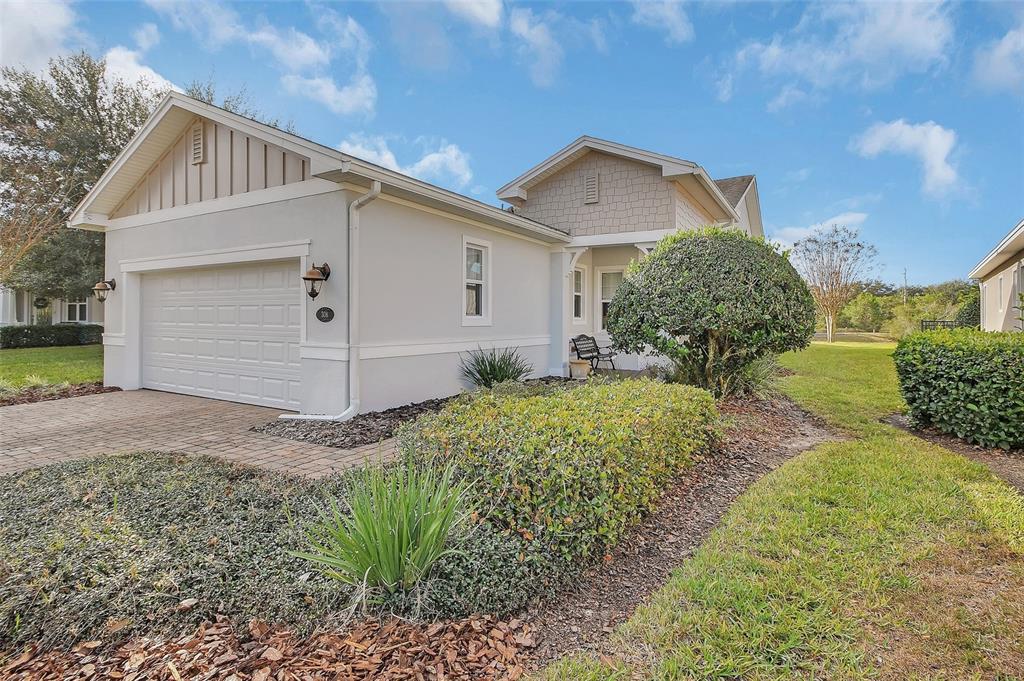 308 Locksley Court Deland, FL 32724 - Photo 35 of 56 a view of a house with a yard and plants
