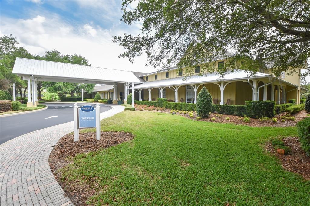 308 Locksley Court Deland, FL 32724 - Photo 42 of 56 a front view of a house with a yard table and chairs
