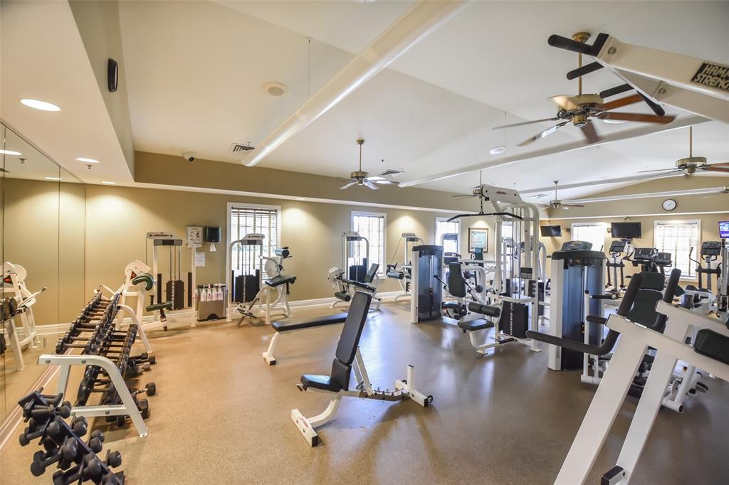 308 Locksley Court Deland, FL 32724 - Photo 44 of 56 a view of a room with gym equipment