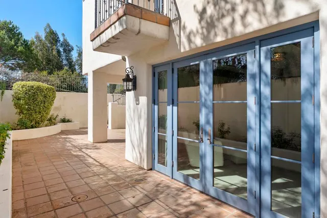 a view of a glass door of the house