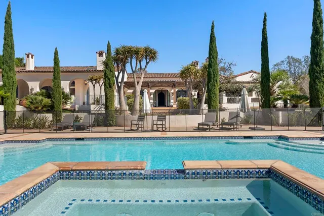 a view of a house with a swimming pool