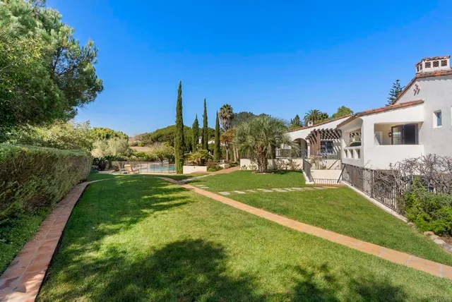 a view of a house with a big yard