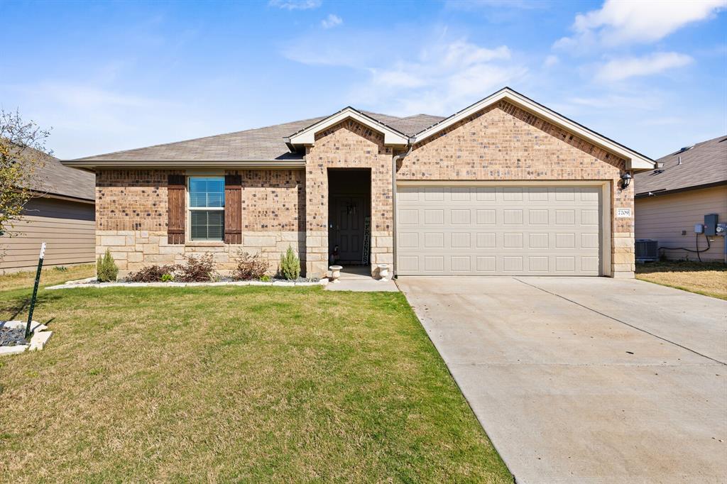 7209 Canadian Drive China Spring, TX 76633 - Photo 2 of 37 a front view of a house with garden