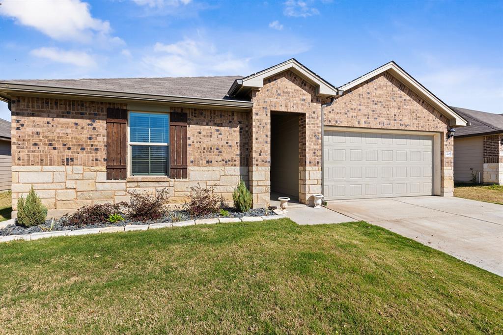 7209 Canadian Drive China Spring, TX 76633 - Photo 3 of 37 front view of a house with a yard