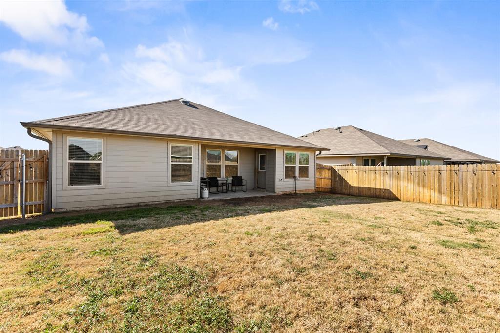 7209 Canadian Drive China Spring, TX 76633 - Photo 33 of 37 a front view of a house with a yard