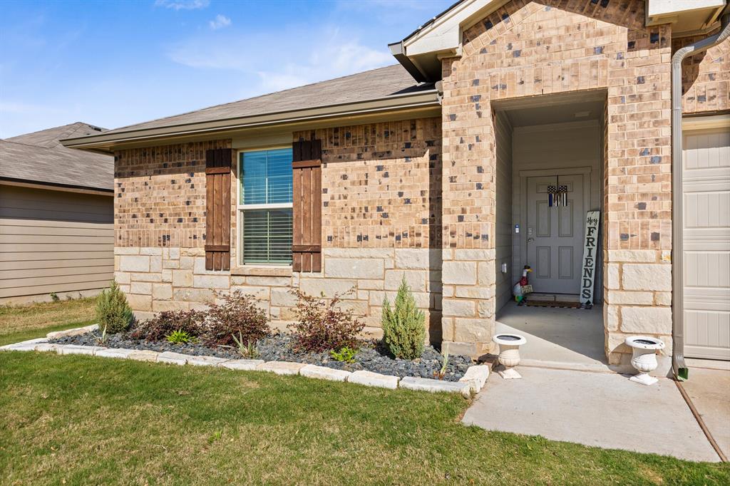 7209 Canadian Drive China Spring, TX 76633 - Photo 4 of 37 front view of a house with a yard