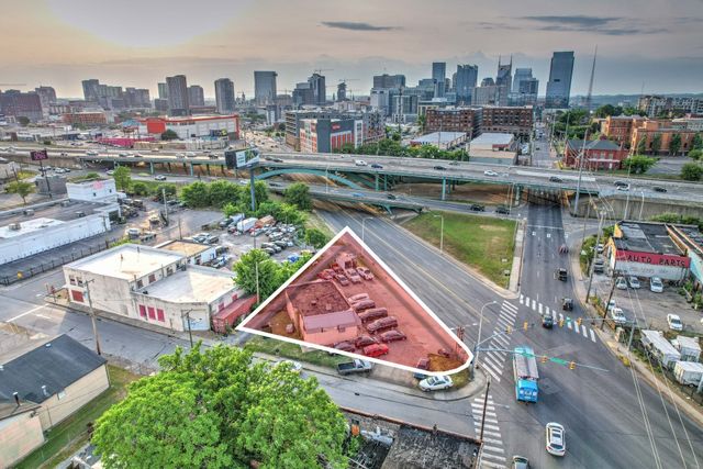 a view of swimming pool with a yard