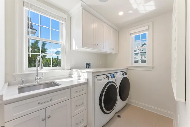 a kitchen with stainless steel appliances granite countertop a stove microwave and cabinets