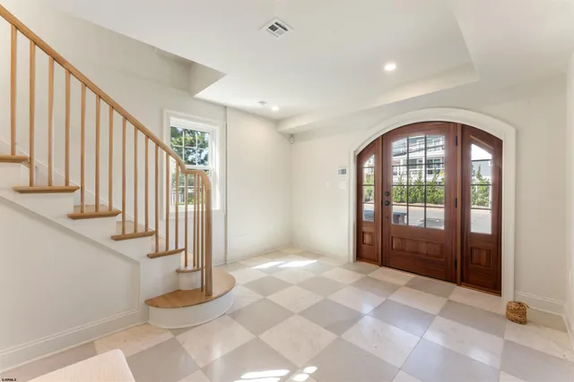 a view of an entryway with staircase