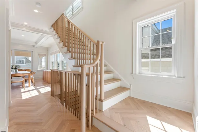 a view of a bathroom with bathtub and shower