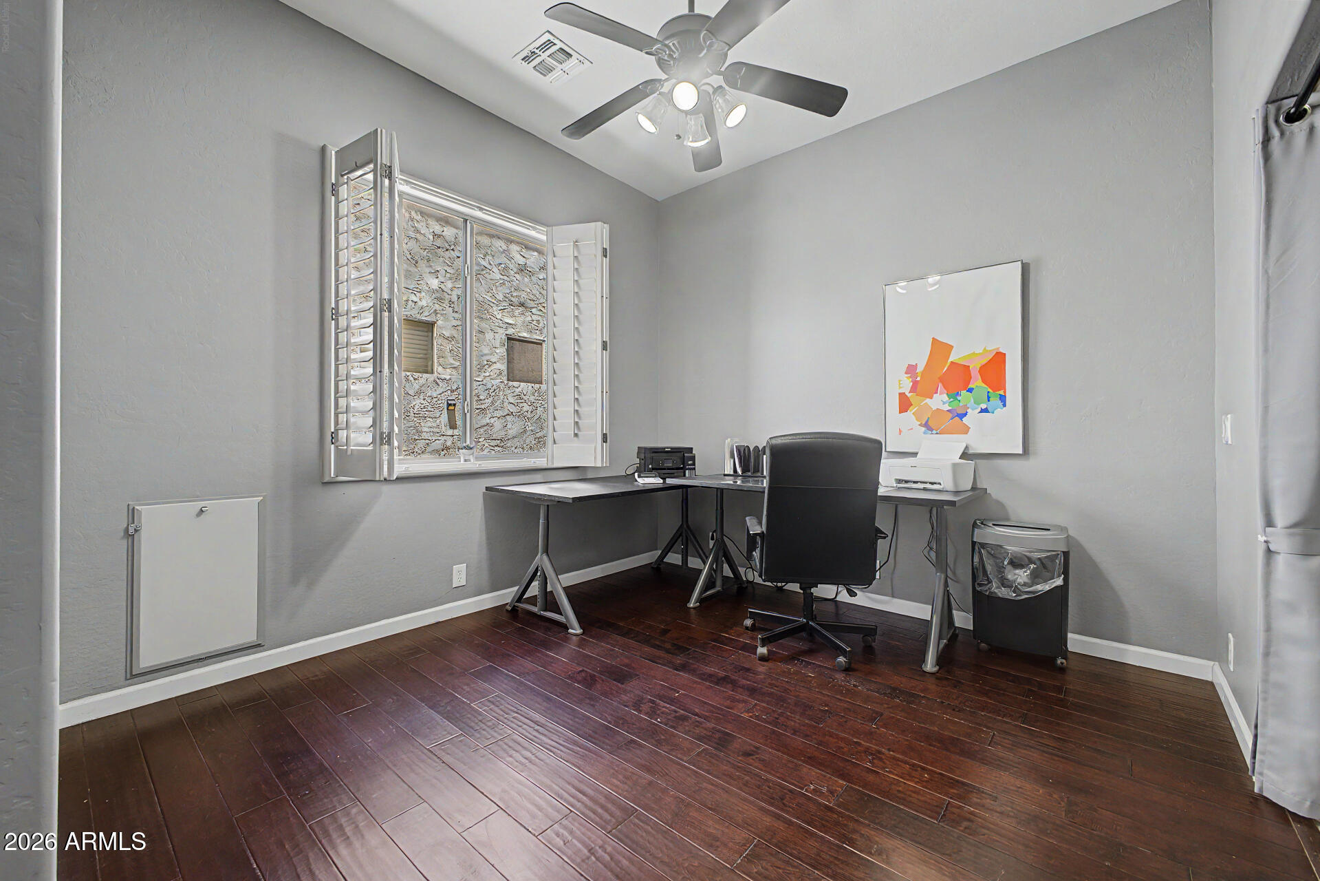 1632 West Frye Road Phoenix, AZ 85045 - Photo 16 of 37 a view of a workspace with furniture and a window