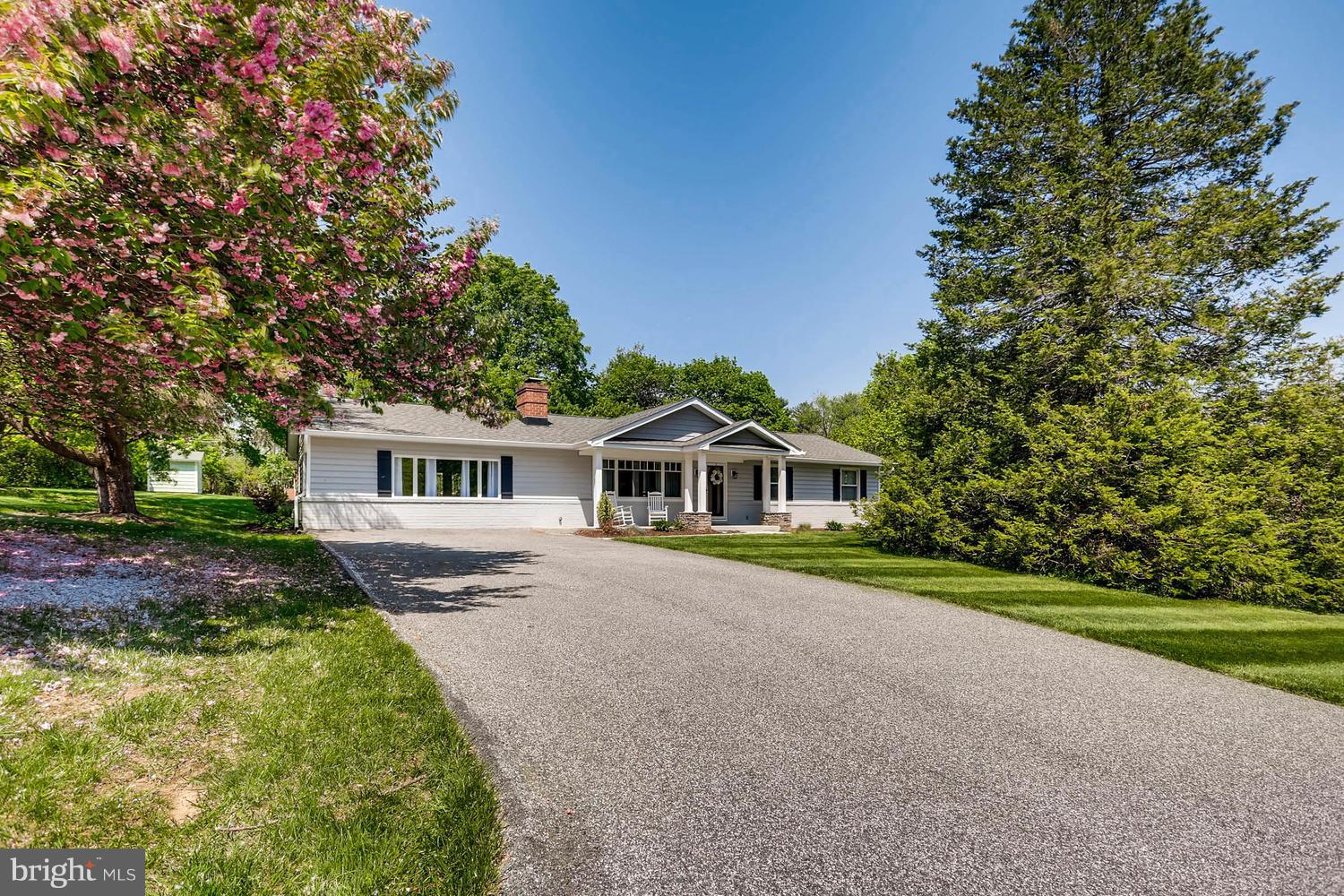14202 Sunburst Road Baldwin, MD 21013 - Photo 2 of 29 a front view of a house with a garden