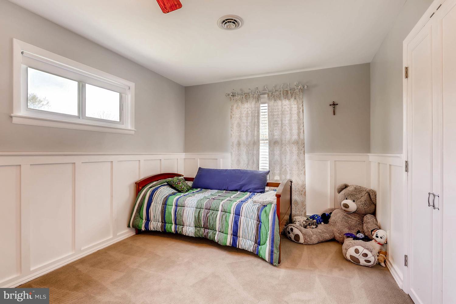 14202 Sunburst Road Baldwin, MD 21013 - Photo 22 of 29 a bedroom with a bed and a window