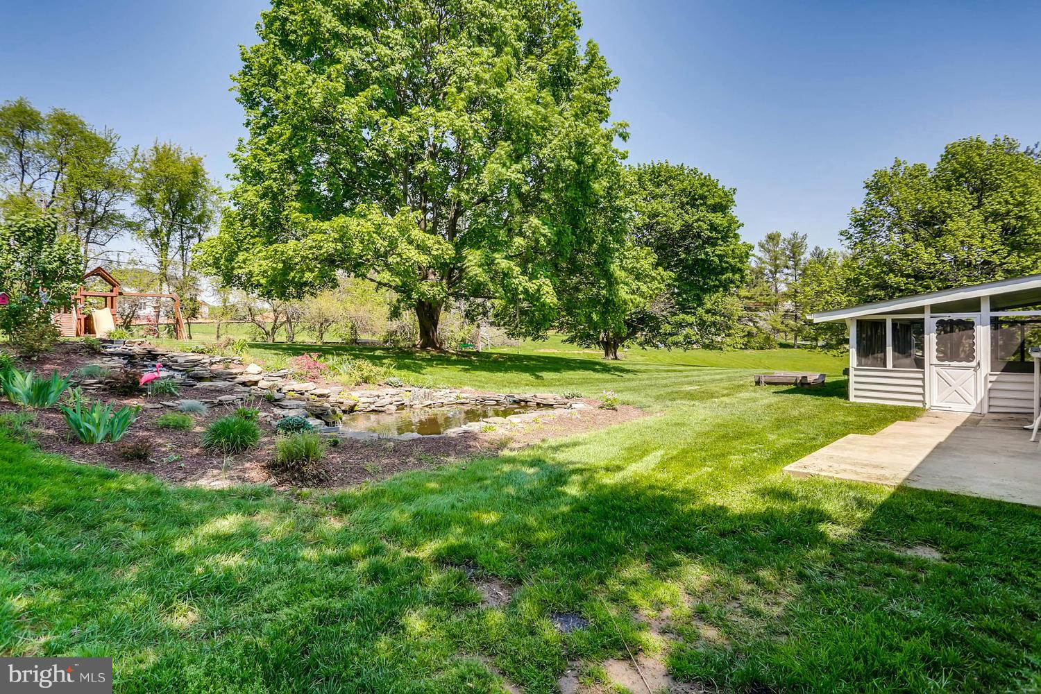 14202 Sunburst Road Baldwin, MD 21013 - Photo 24 of 29 a view of a backyard with large trees