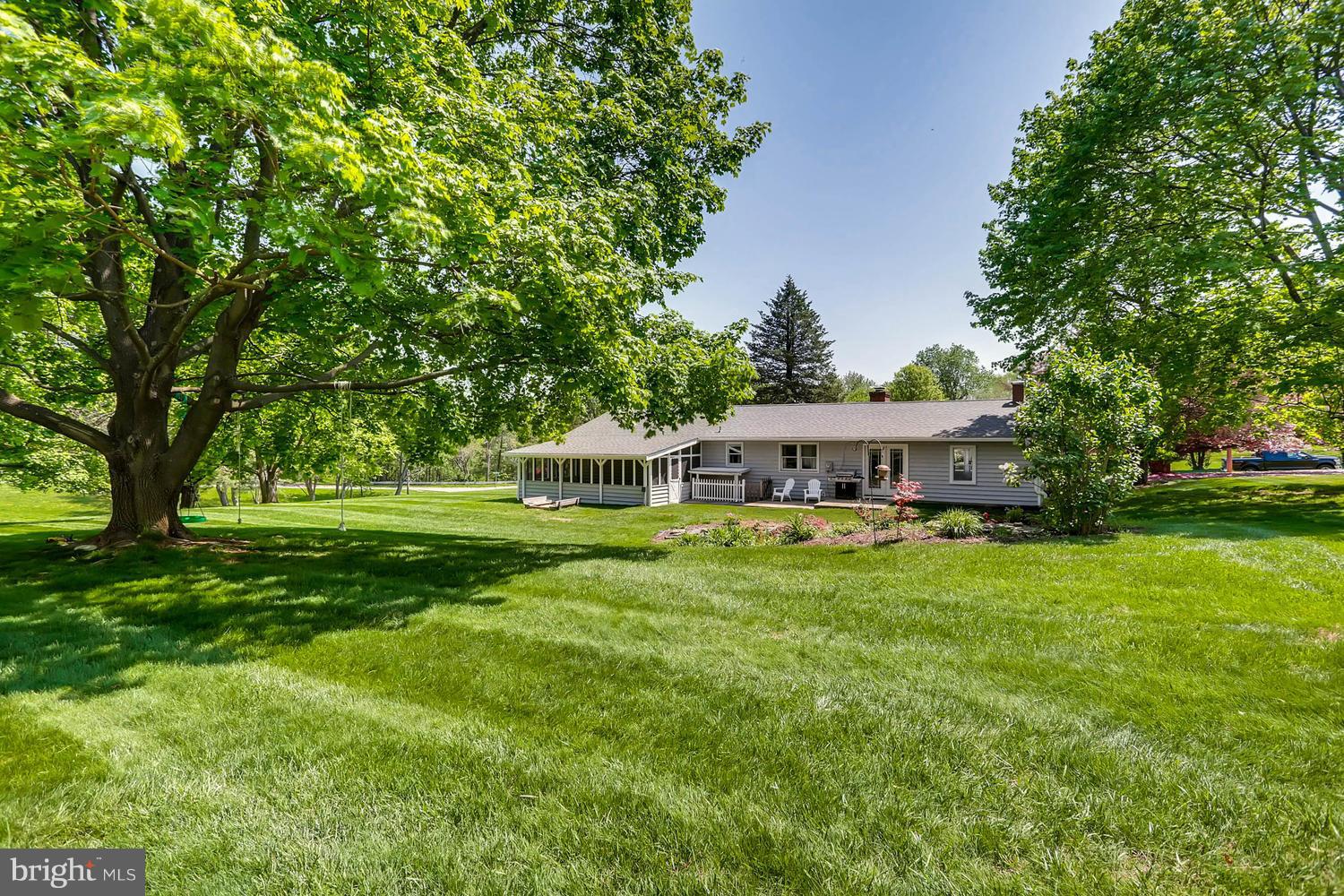 14202 Sunburst Road Baldwin, MD 21013 - Photo 25 of 29 a front view of a house with garden