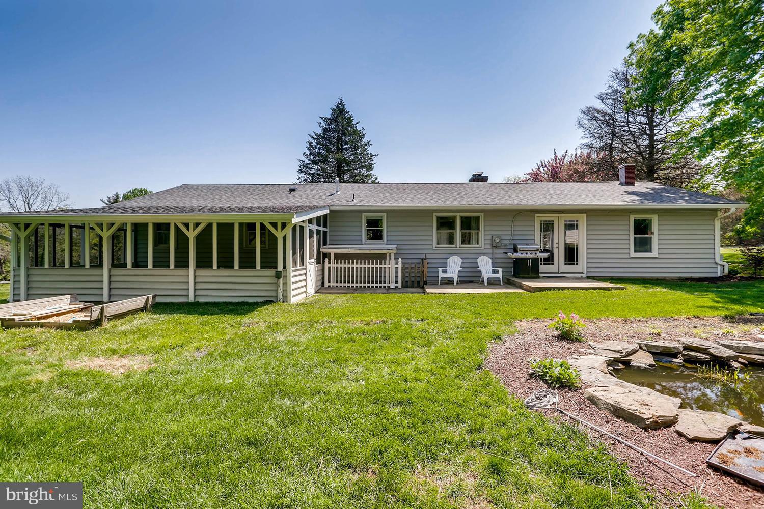 14202 Sunburst Road Baldwin, MD 21013 - Photo 28 of 29 a view of a house with swimming pool and porch with furniture