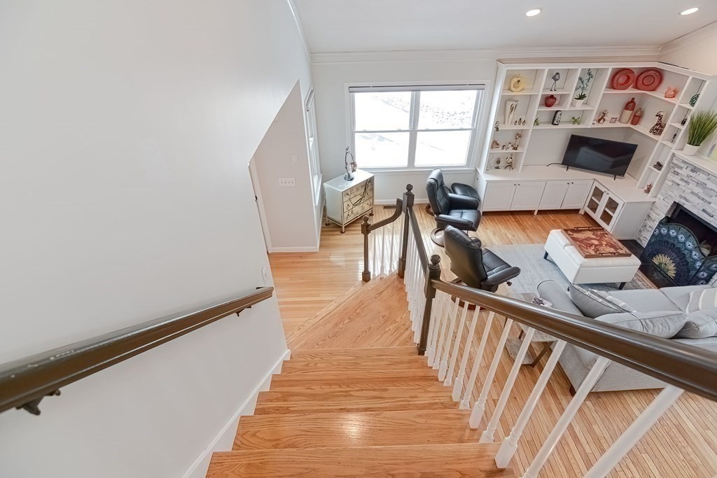 18 Carnation Circle, Unit B Reading, MA 01867 - Photo 33 of 42 a view of a living room and a window