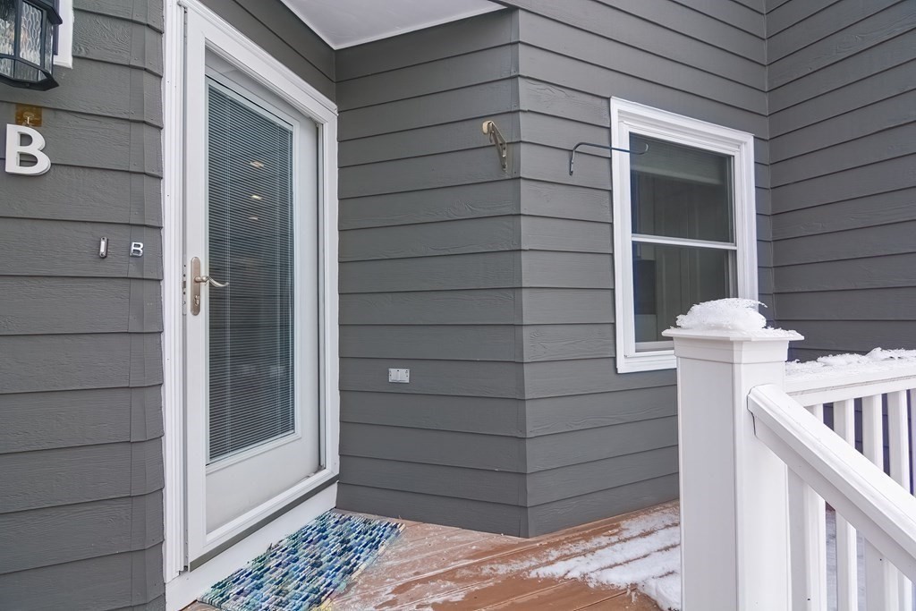 18 Carnation Circle, Unit B Reading, MA 01867 - Photo 5 of 42 a view of front door of house