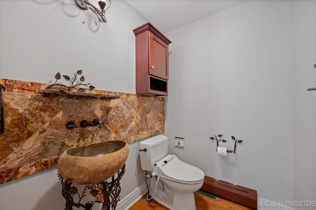 a bathroom with a sink and a toilet