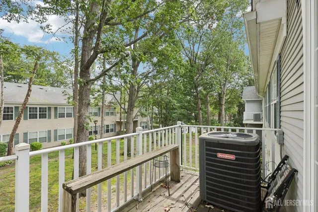 a view of a balcony with a trees
