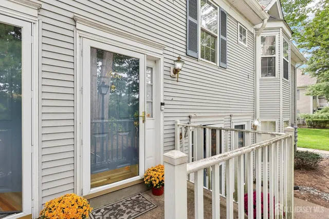 a view of porch with a small deck
