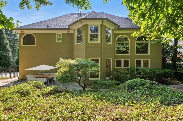 a view of a garden with a fountain