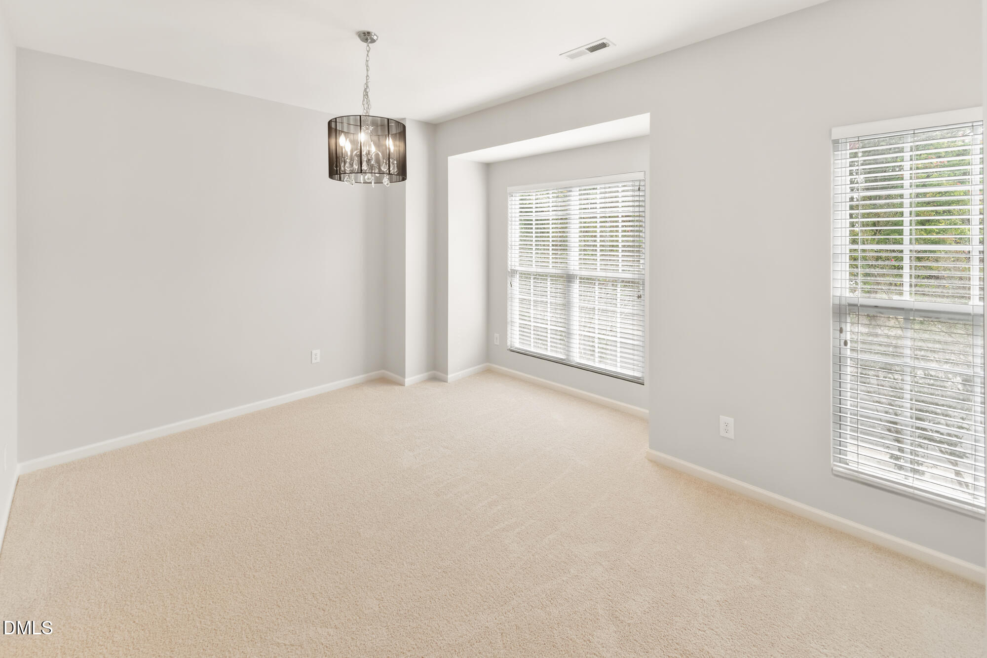 3123 Winding Waters Way Raleigh, NC 27614 - Photo 17 of 57 a view of an empty room with a window