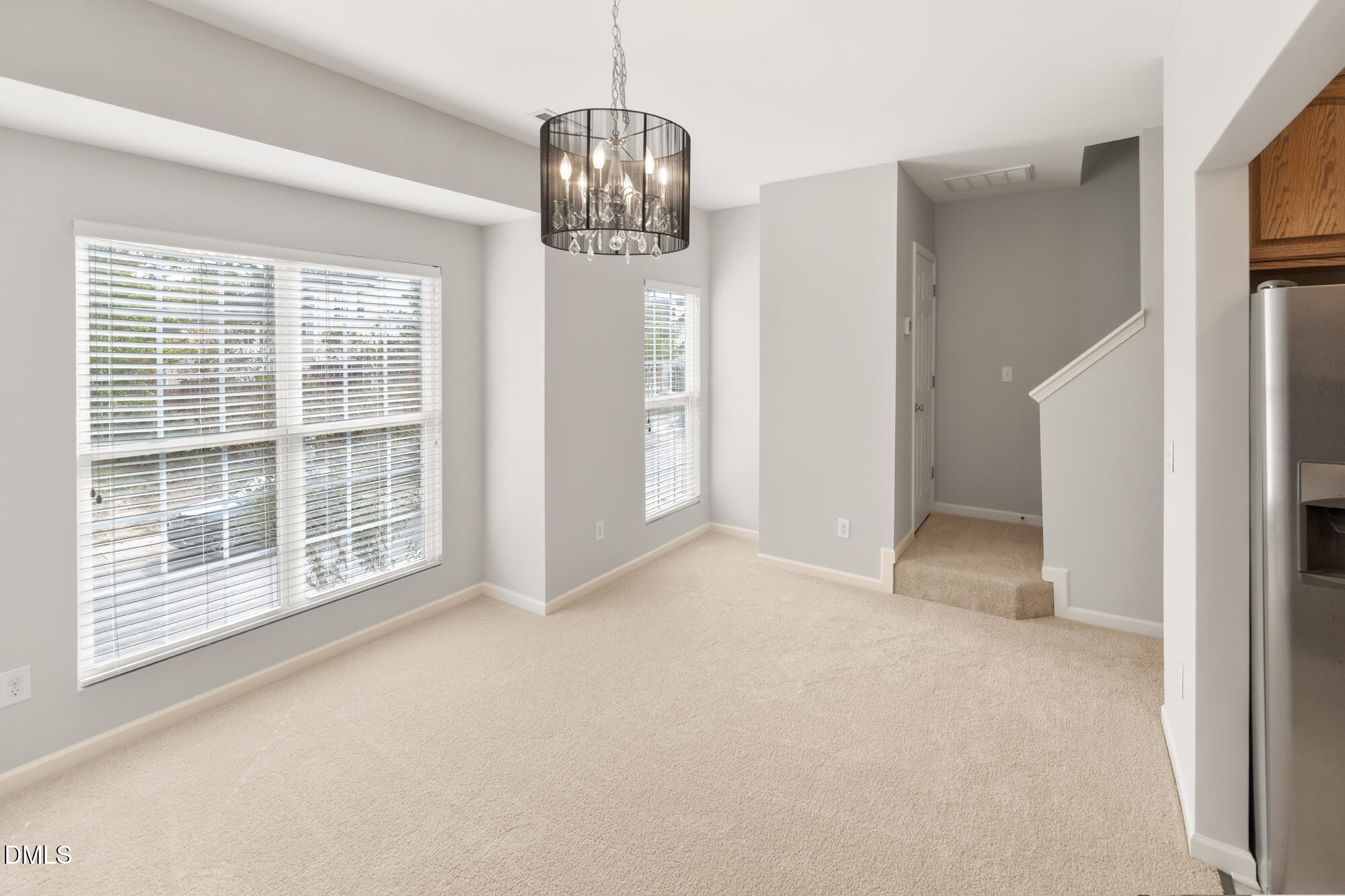 3123 Winding Waters Way Raleigh, NC 27614 - Photo 21 of 57 a view of an empty room with a window