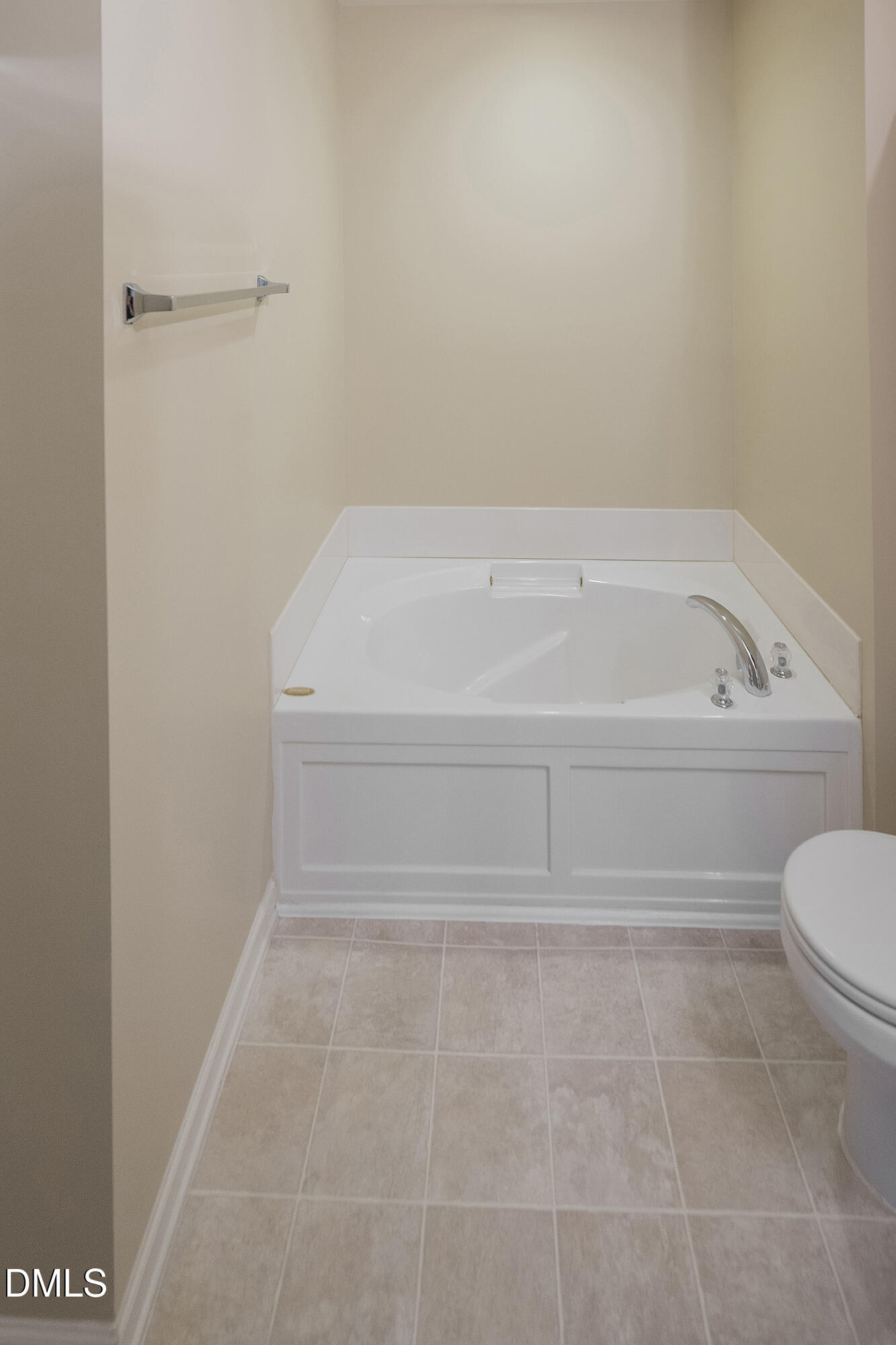 3123 Winding Waters Way Raleigh, NC 27614 - Photo 30 of 57 a bathroom with a bathtub