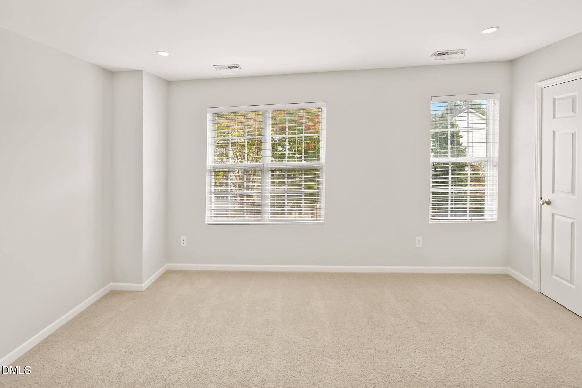 3123 Winding Waters Way Raleigh, NC 27614 - Photo 39 of 57 an empty room with windows