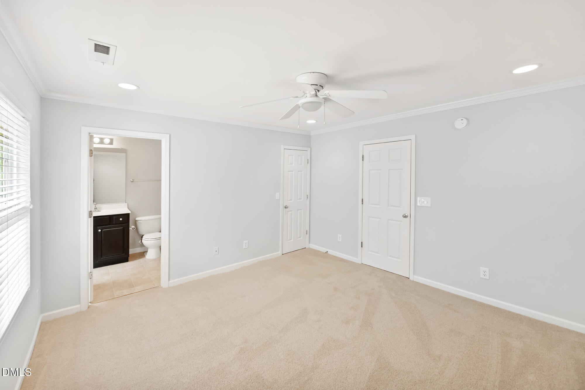3123 Winding Waters Way Raleigh, NC 27614 - Photo 41 of 57 an empty room with closet and windows