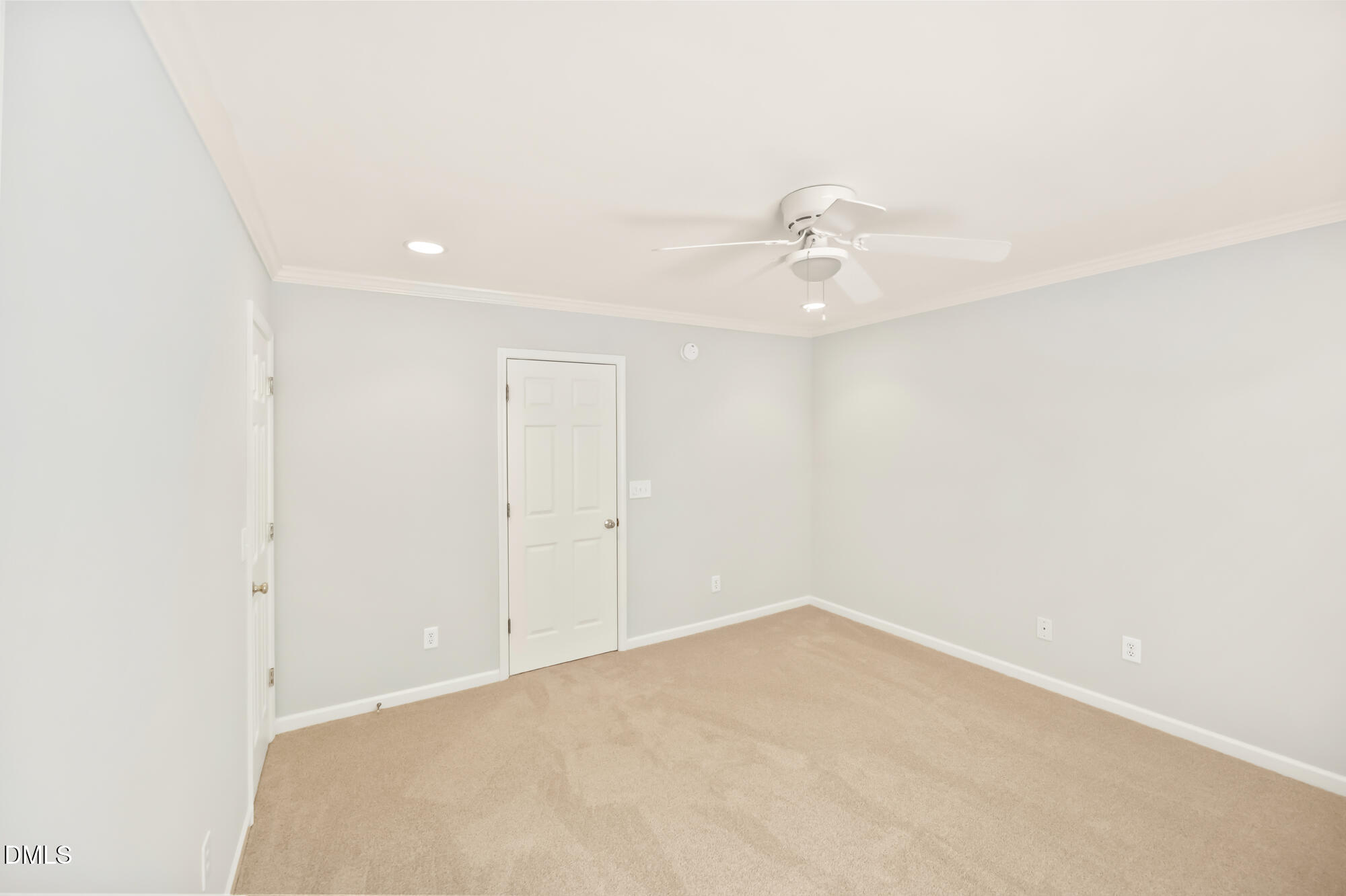3123 Winding Waters Way Raleigh, NC 27614 - Photo 42 of 57 an empty room with a ceiling fan and a window