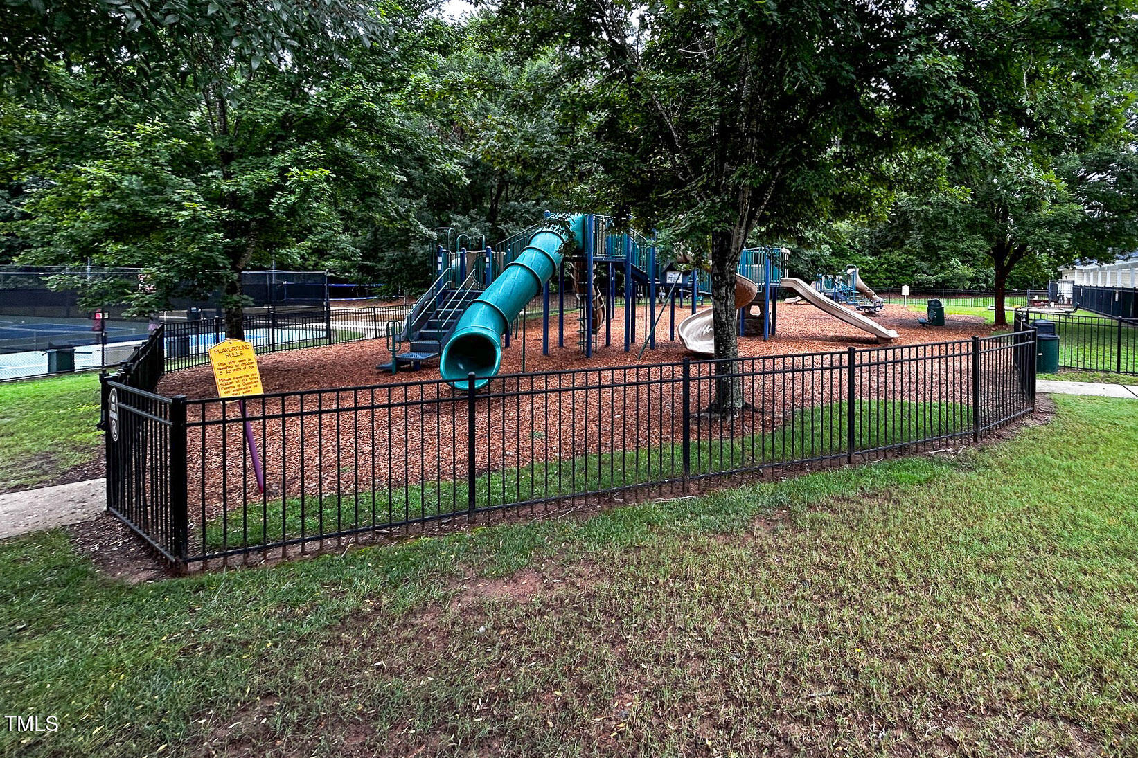 3123 Winding Waters Way Raleigh, NC 27614 - Photo 48 of 57 a view of a deck with a small yard