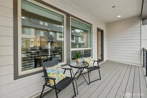 a view of a chairs in a balcony