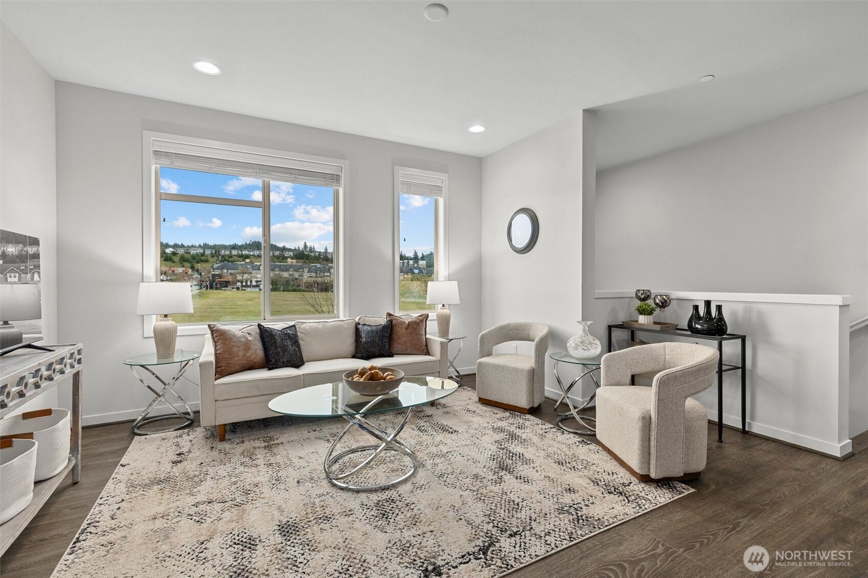 983 8th Avenue Northeast Issaquah, WA 98029 - Photo 4 of 40 a living room with patio furniture and floor to ceiling windows