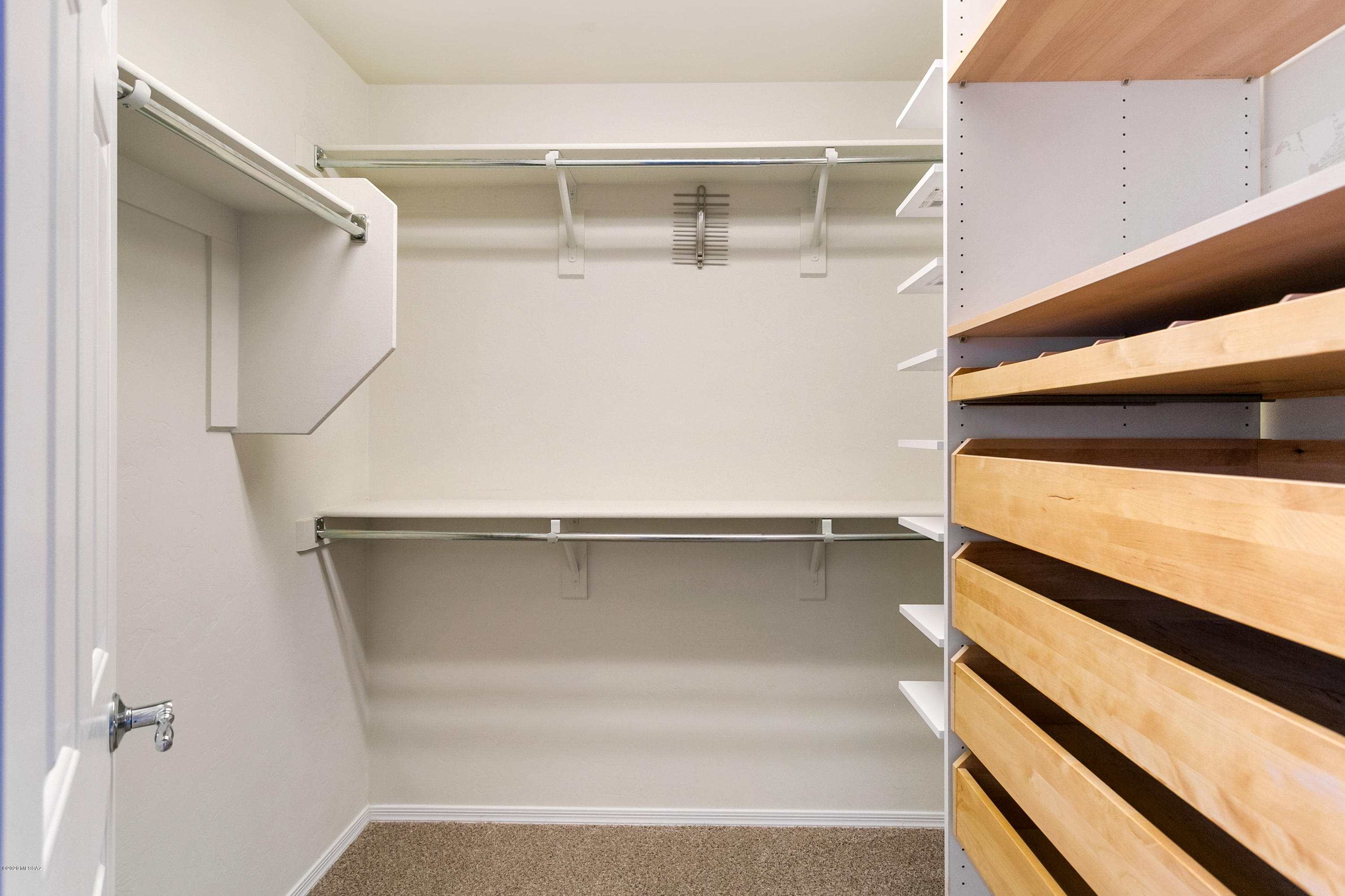 21027 East Treasure Road Red Rock, AZ 85145 - Photo 18 of 29 a view of an empty walk in closet