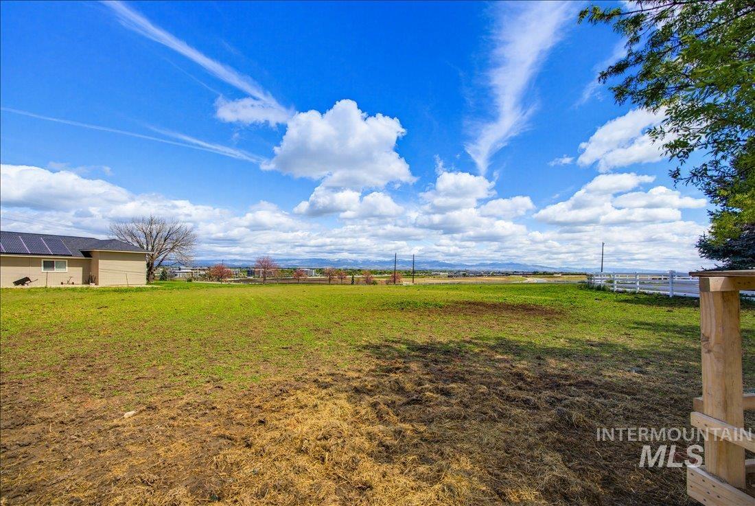 1901 South Ten Mile Road Meridian, ID 83642 - Photo 31 of 32 Expansive grass and dirt lot with partial fencing