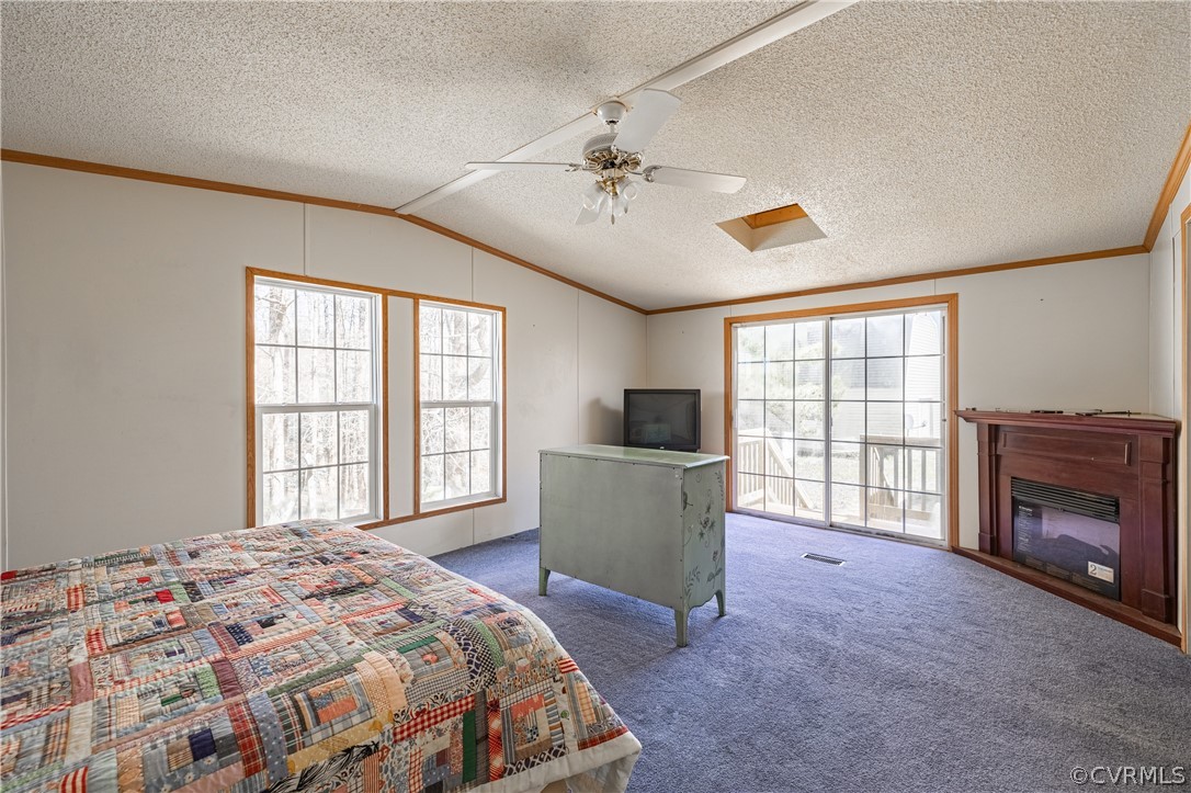 382 Fairview Road Blackstone, VA 23824 - Photo 17 of 32 a spacious bedroom with a bed and a television