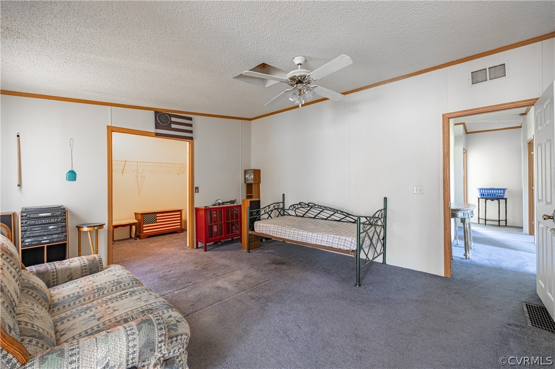 382 Fairview Road Blackstone, VA 23824 - Photo 19 of 32 a bedroom with furniture and a ceiling fan