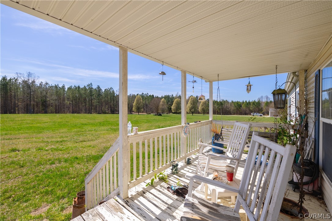 382 Fairview Road Blackstone, VA 23824 - Photo 24 of 32 a view of a chairs and table in the balcony