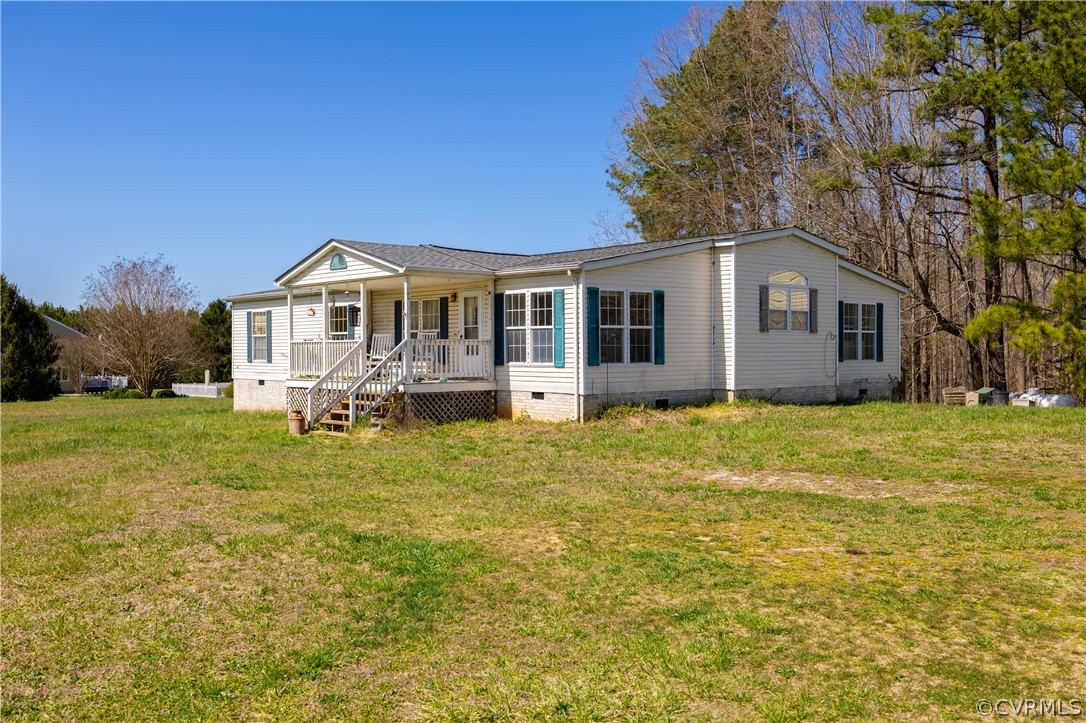 382 Fairview Road Blackstone, VA 23824 - Photo 28 of 32 a front view of a house with a garden