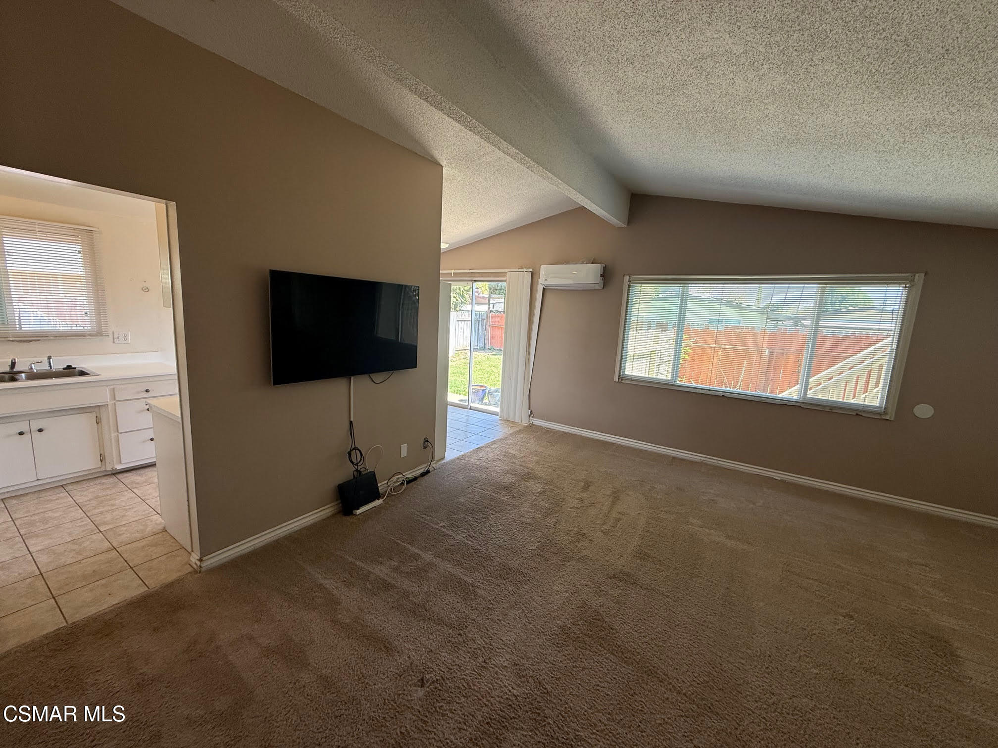 1482 Paul Street Simi Valley, CA 93065 - Photo 2 of 12 a view of empty room with window and flat screen tv