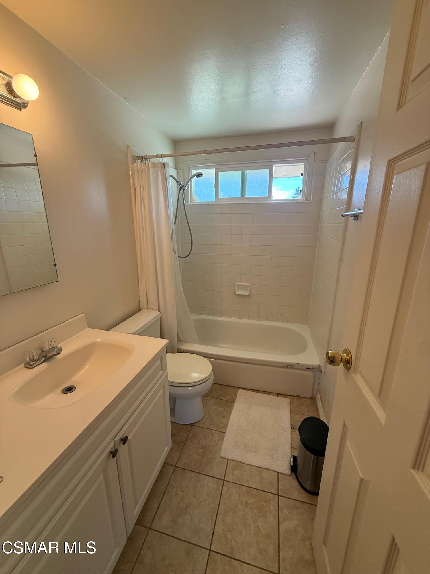 1482 Paul Street Simi Valley, CA 93065 - Photo 9 of 12 a bathroom with a toilet sink and mirror
