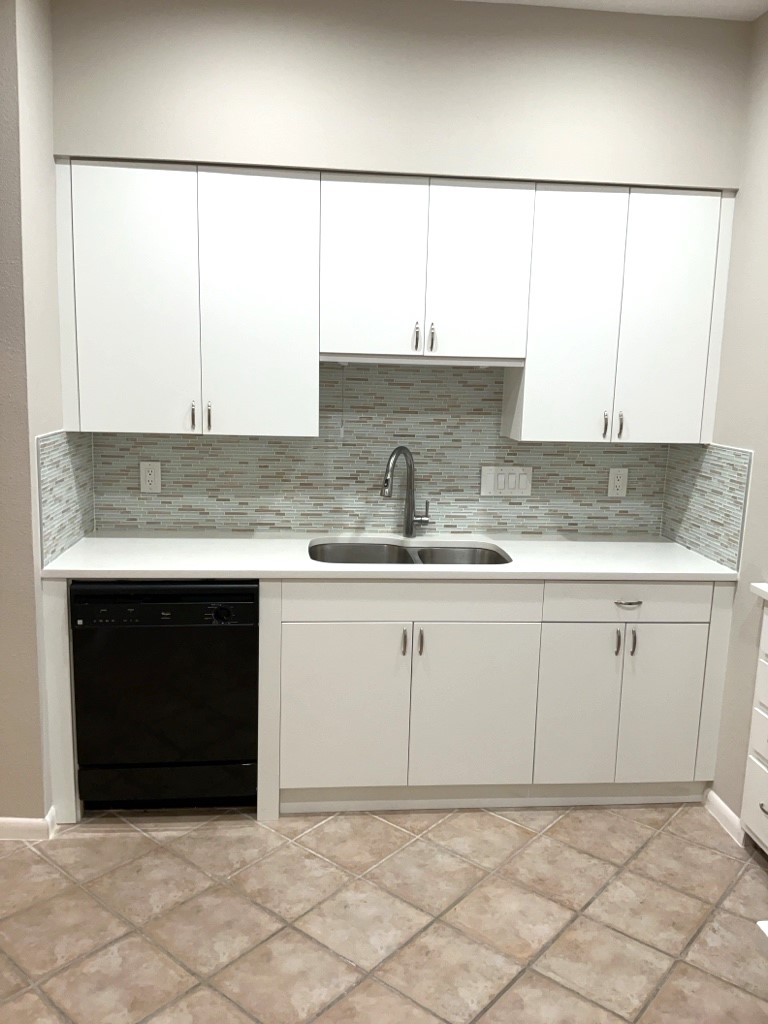 3200 Duval Street, Unit 102 Austin, TX 78705 - Photo 10 of 20 a kitchen with a sink and cabinets