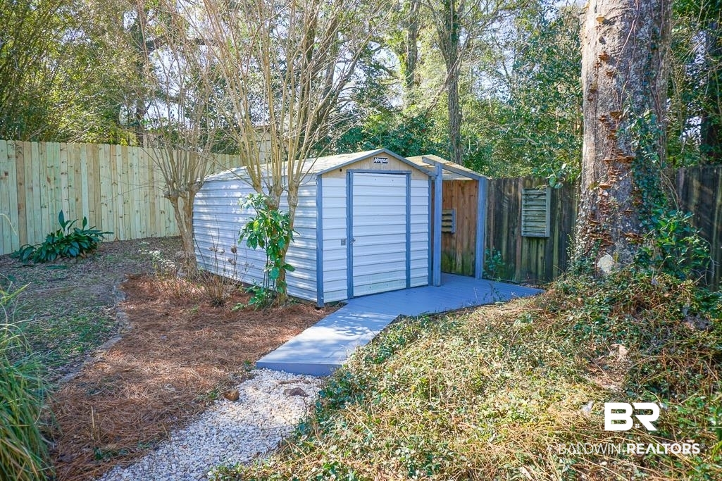 4159 Rebecca Road Mobile, AL 36609 - Photo 11 of 19 View of shed featuring a fenced backyard