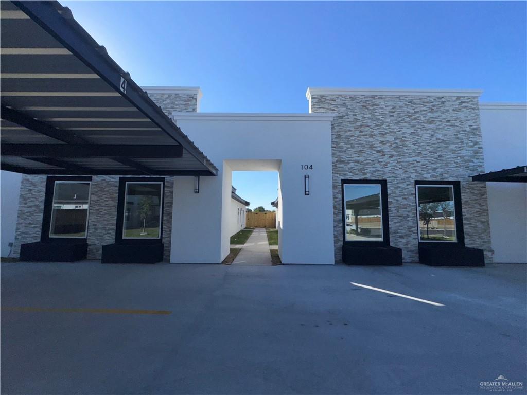 104 Sunflower Street, Unit 3 Mission, TX 78572 - Photo 1 of 1 a view of a livingroom with a staircase