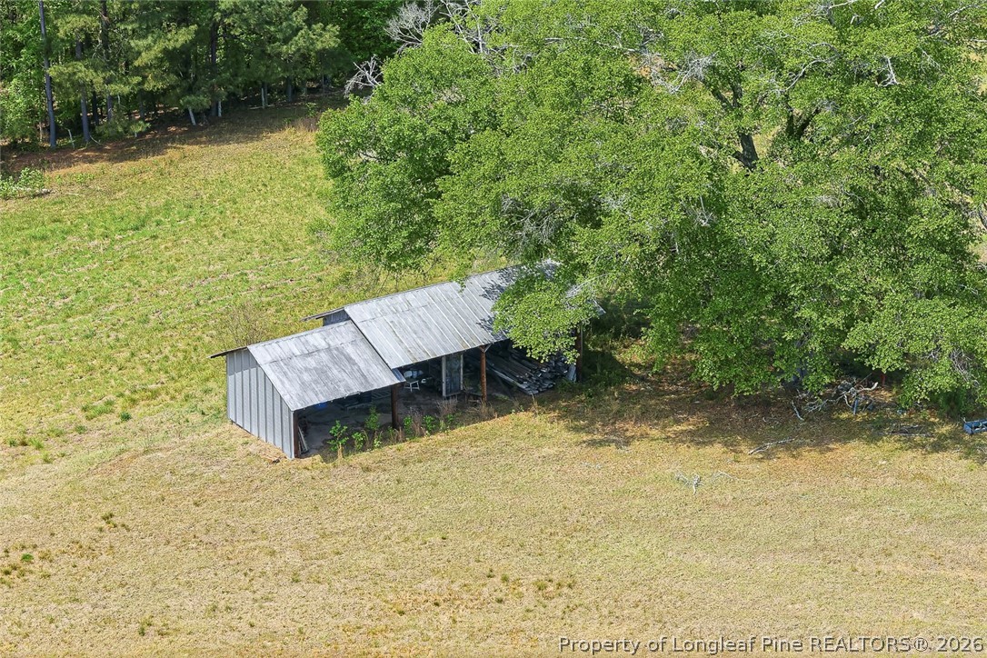 249 Nicholson Road Rockingham, NC 28379 - Photo 33 of 47 a view of a wooden deck and lake view