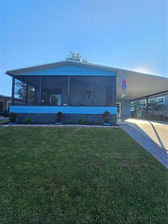 a view of yard with swimming pool and yard