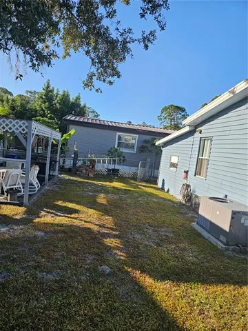 a view of a house with swimming pool